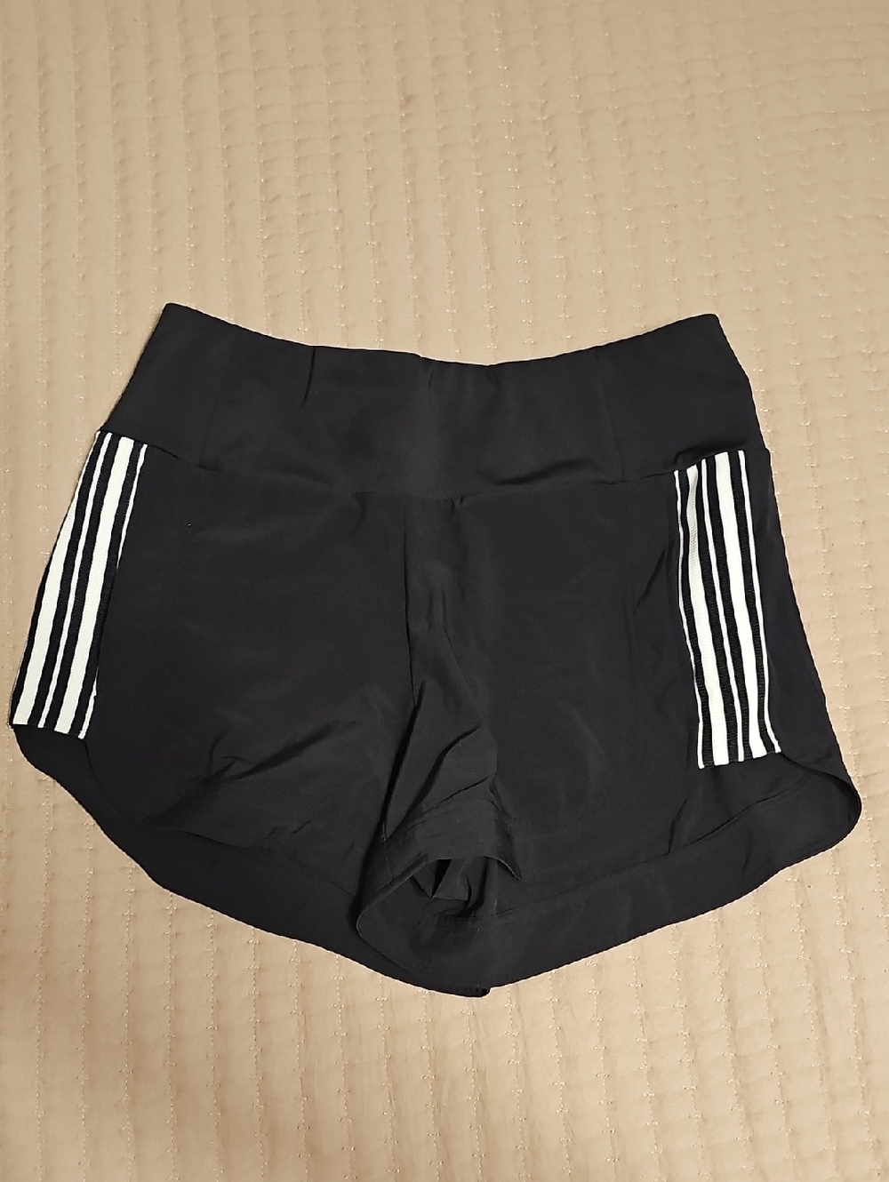Athleta Black Athletic Shorts with White Side Stripes